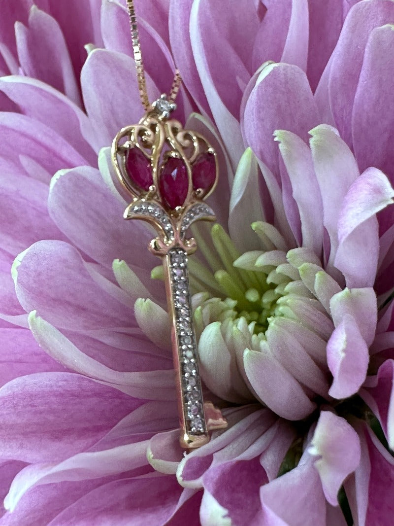 14 Karat Yellow Key with Pink Sapphires and Diamonds