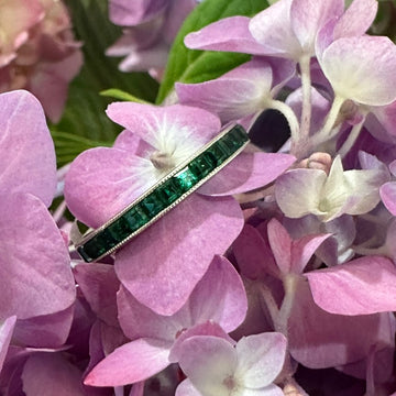 14 Karat White Gold Green Glass Eternity Band